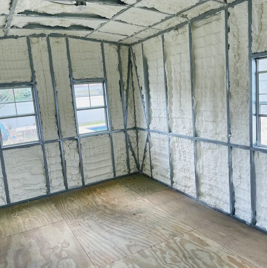 Closed-cell spray foam insulation applied to wall cavities in a residential project in Country Club Hills